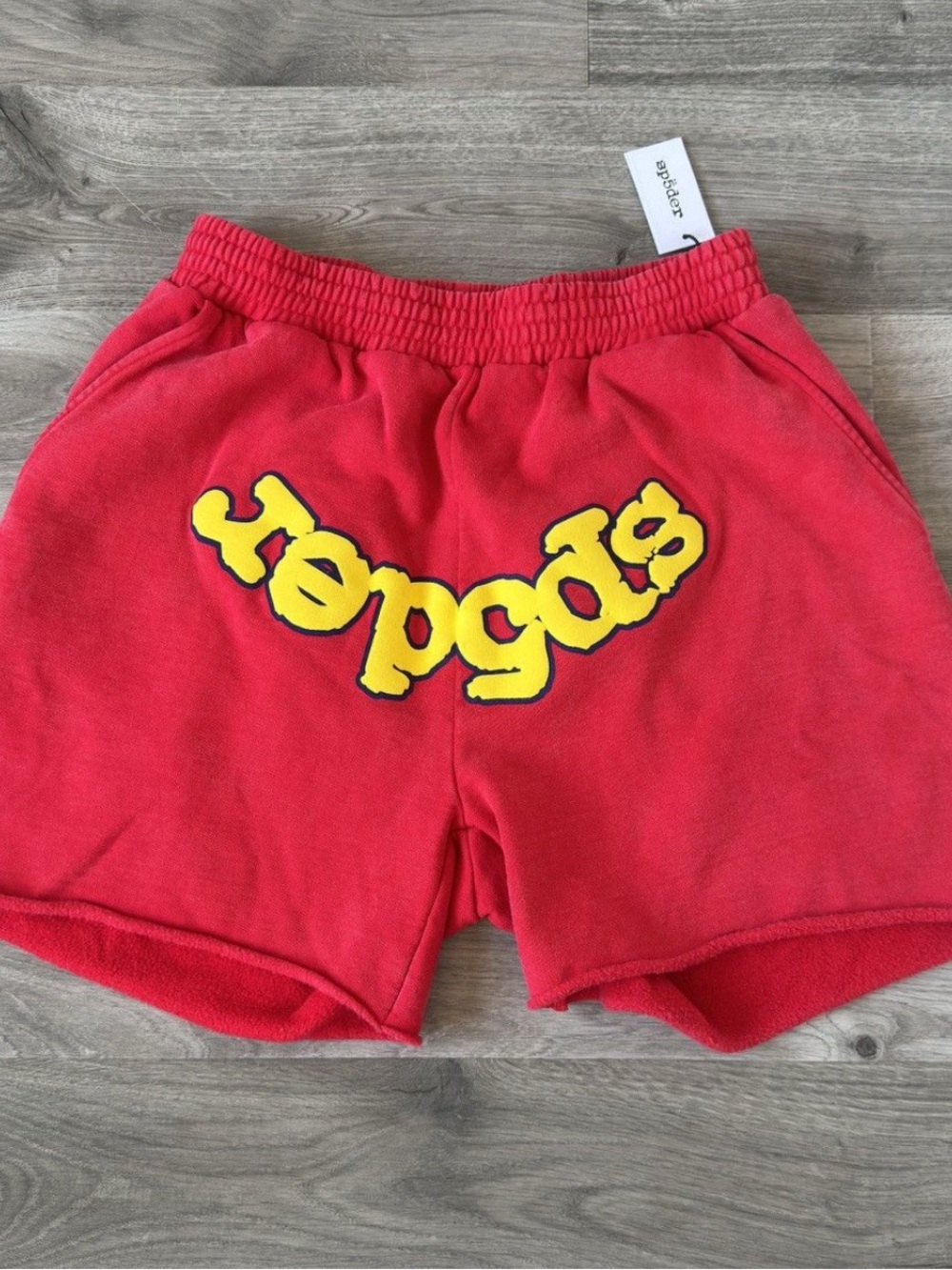 Kith Red Shorts with Yellow Logo